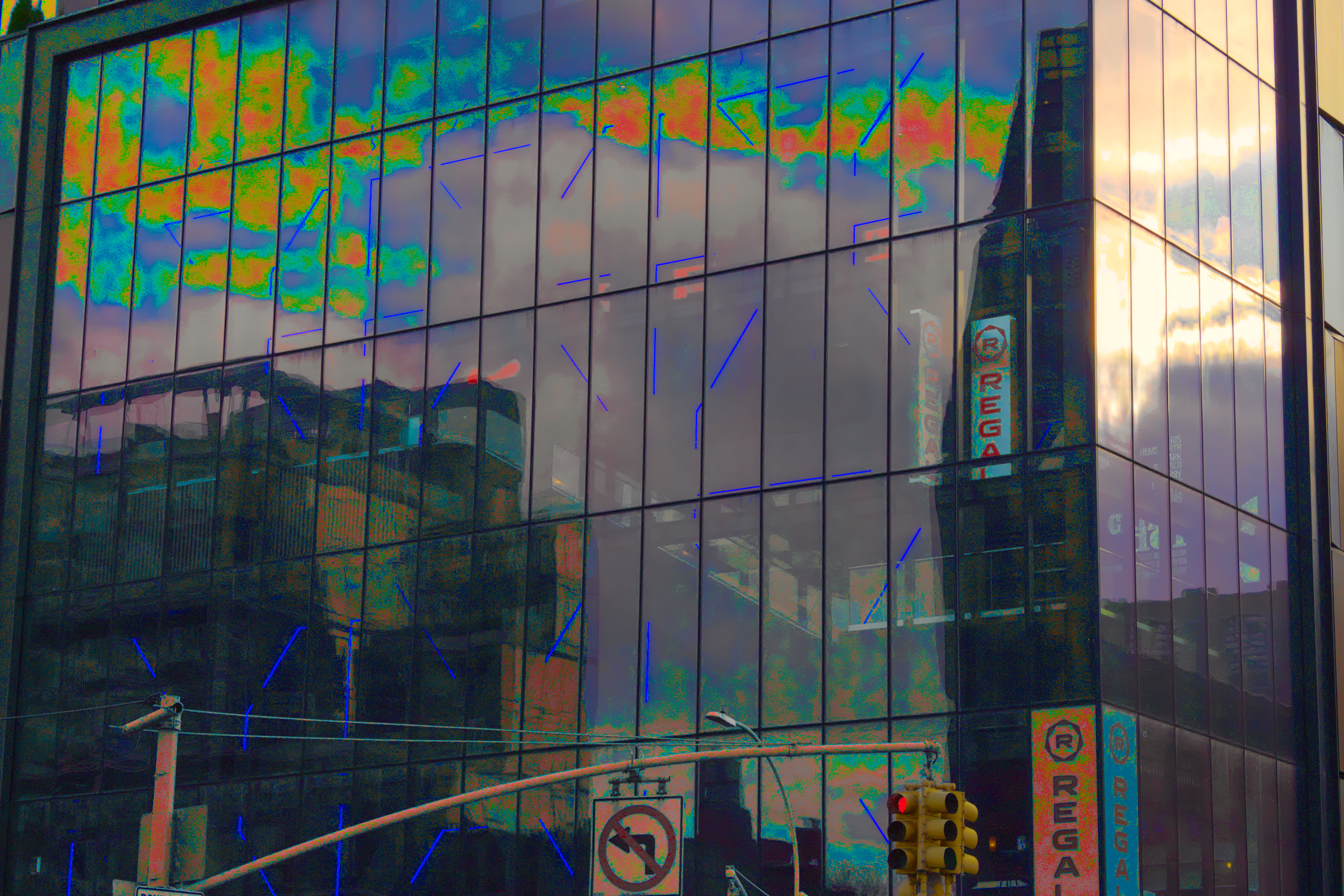 on the left of a building, a fairly normal-looking cloud is reflected in its glass. on the shaded side, those same clouds are transformed into rainbow heatmaps. inside the building, some impossibly-glowing pipes are arranged in geometric patterns. everything besides the clouds is crunchy + distorted.