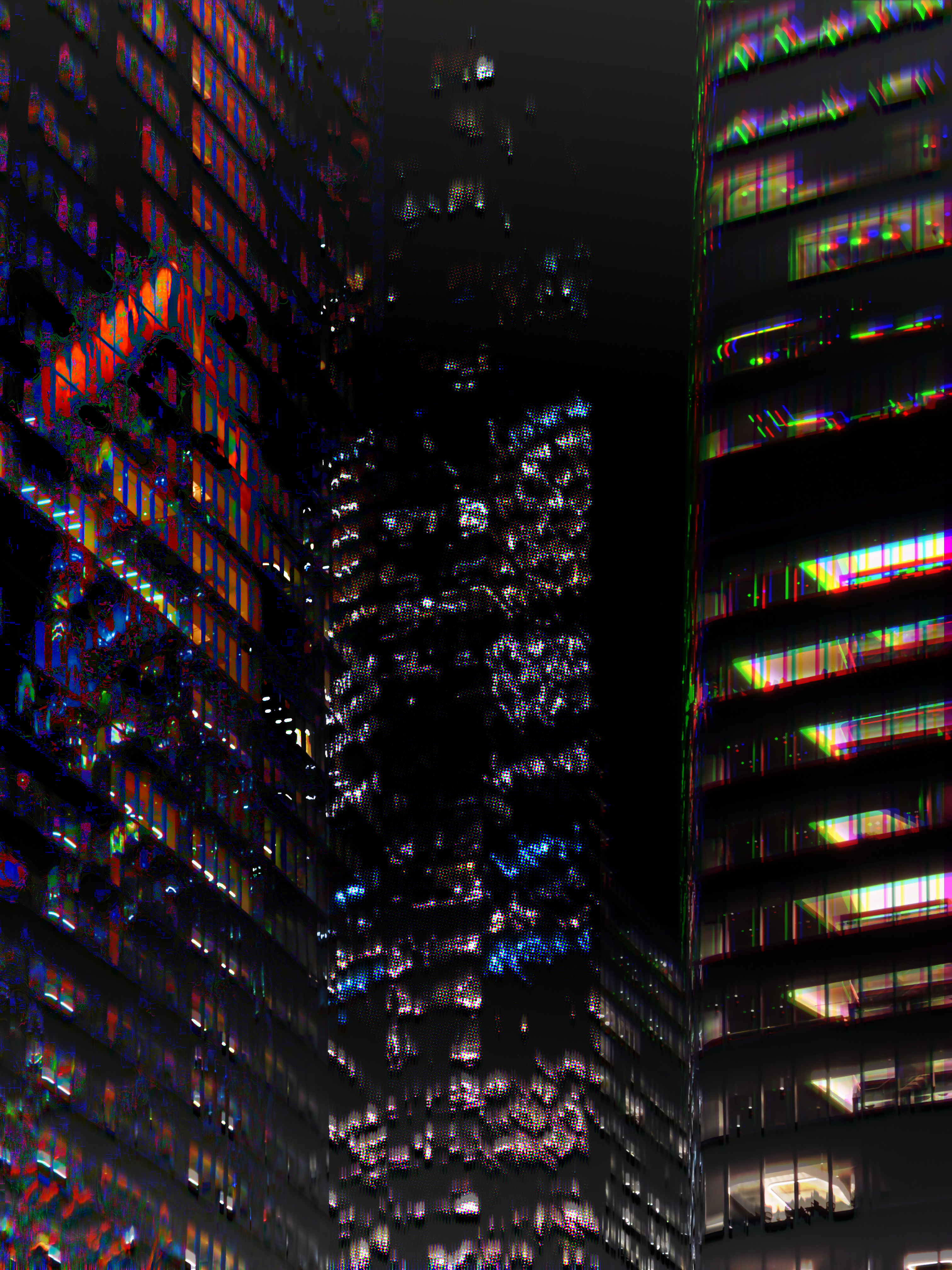 three buildings loom in the night, each corrupted in their own way, standing over the light from the streets below & reaching up toward a light up above, both out-of-frame, crowded out by the full height of the buildings.