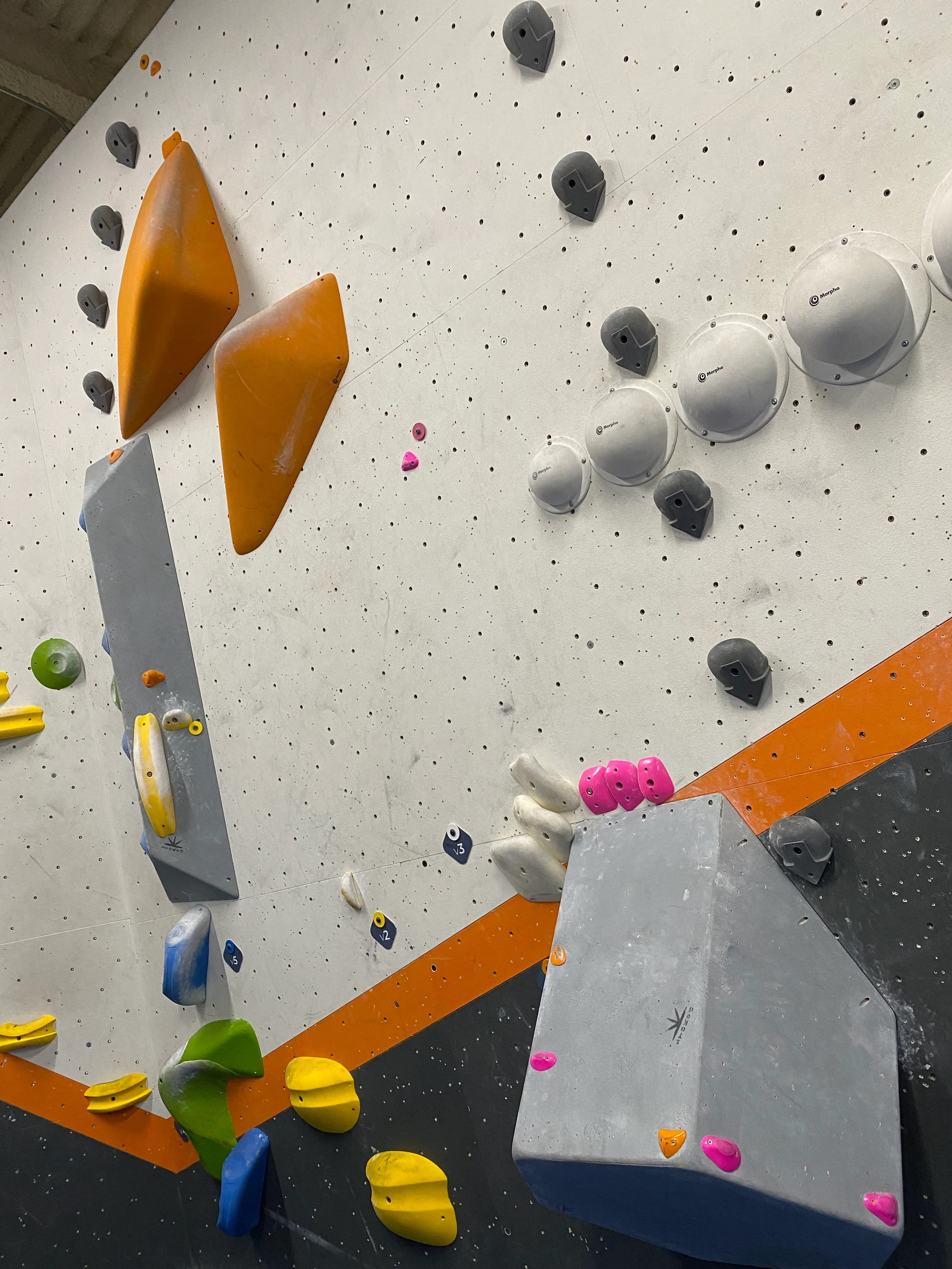 a bouldering route that starts on a volume with small footholds you have to leap from, into a slightly awkward finish